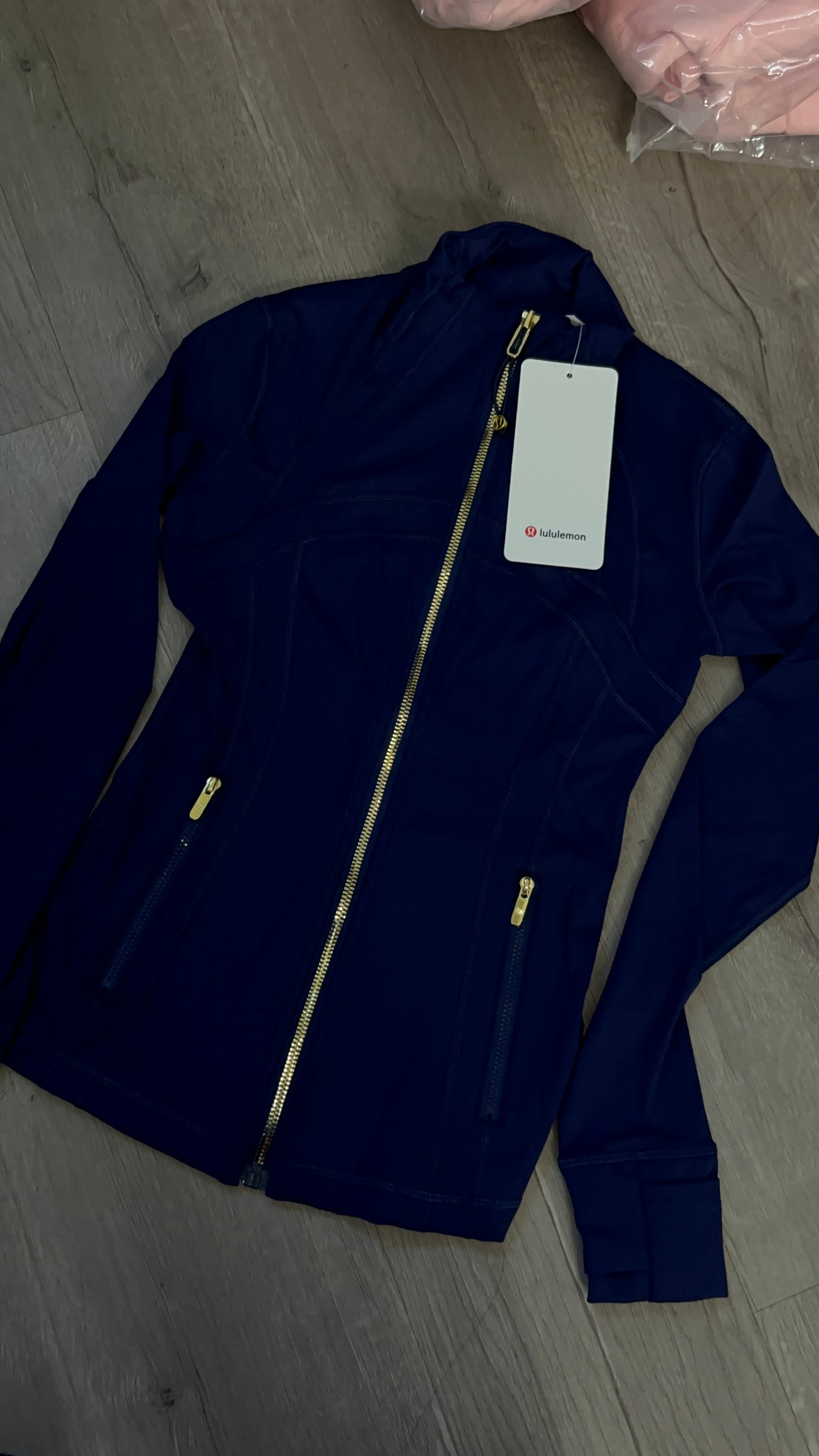 Navy blue gold zipper define jacket